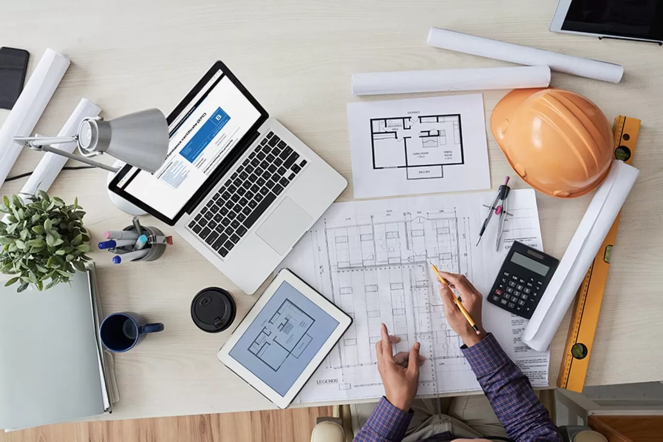 building plans on a desk