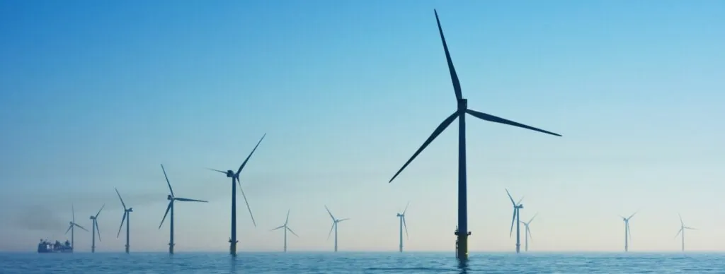 clean energy in scotland in the form of offshore wind (wind turbines in the sea)