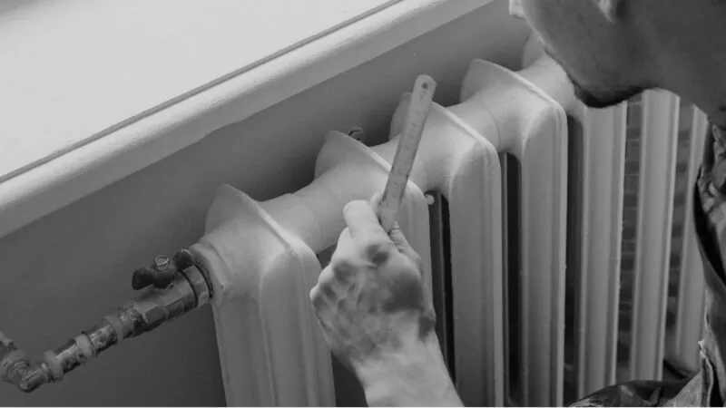 Man Working On Radiator B&W