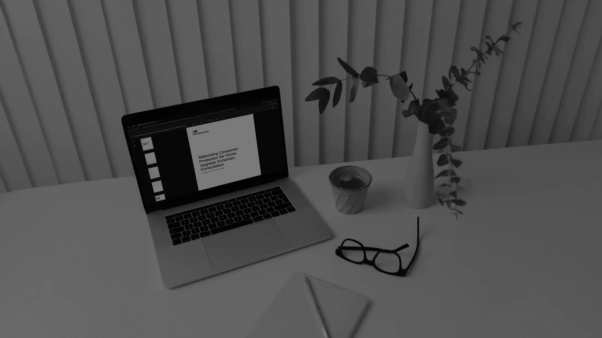 The Warm Homes Plan Open Consultation on a laptop