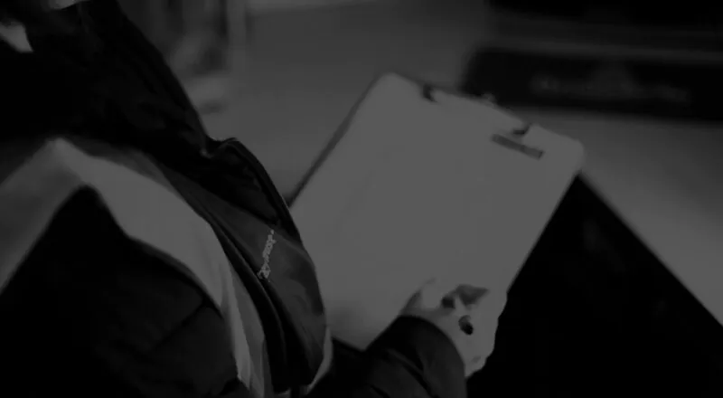 Domestic Energy Assessor Writing On Floor Plan
